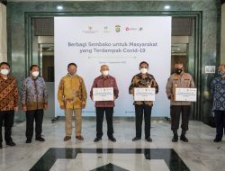 Sinergi KemenKopUKM Berbagi Sembako Bagi Masyarakat UMKM Terdampak Covid-19