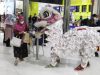 Meriahkan Tahun Baru Imlek Barongsai Hibur Penumpang di Stasiun Gambir dan Pasar Senen